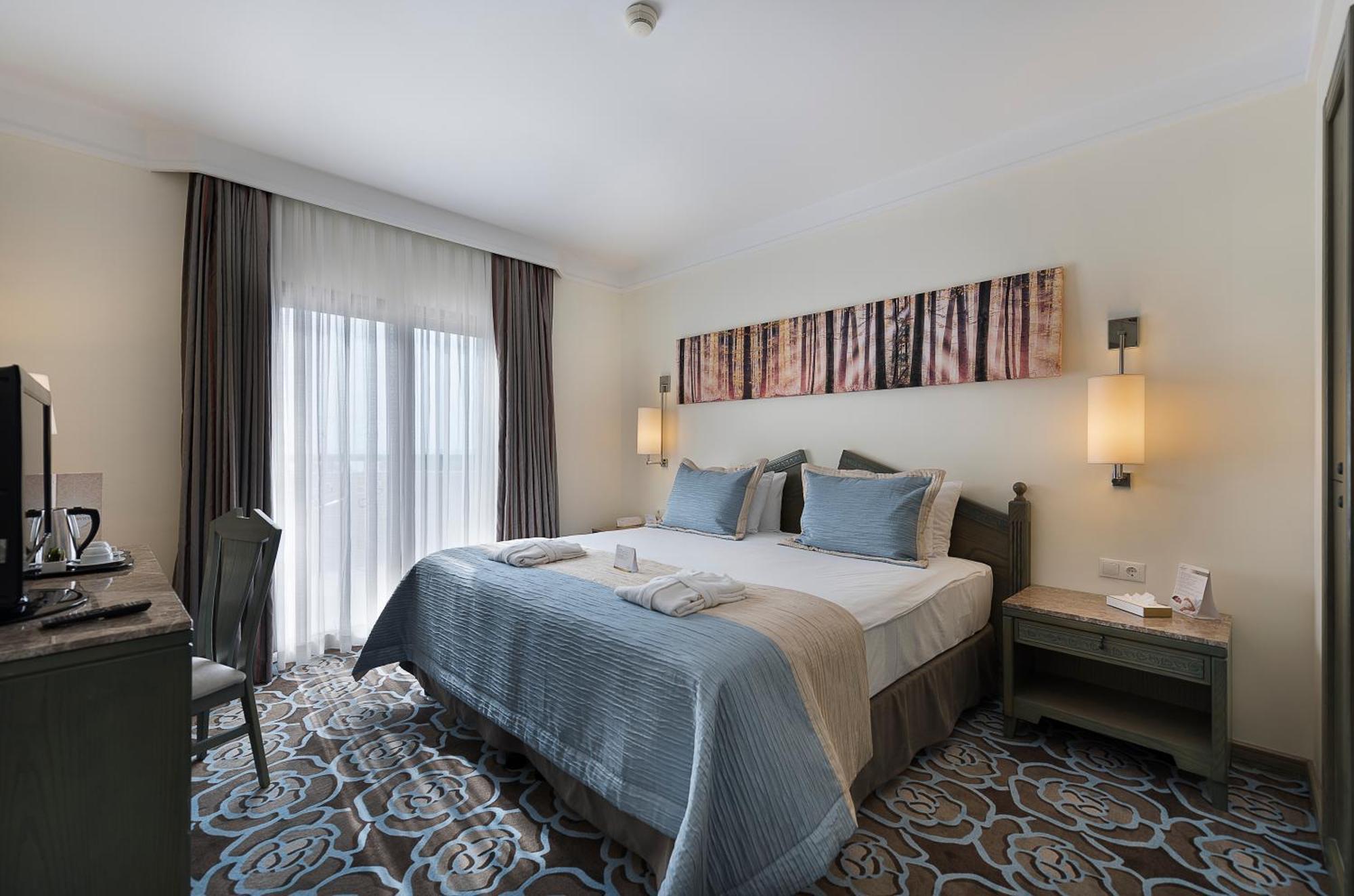 Suite Junior dans Bâtiment Principal - Vue sur Mer (2 Adultes + 2 Enfants)