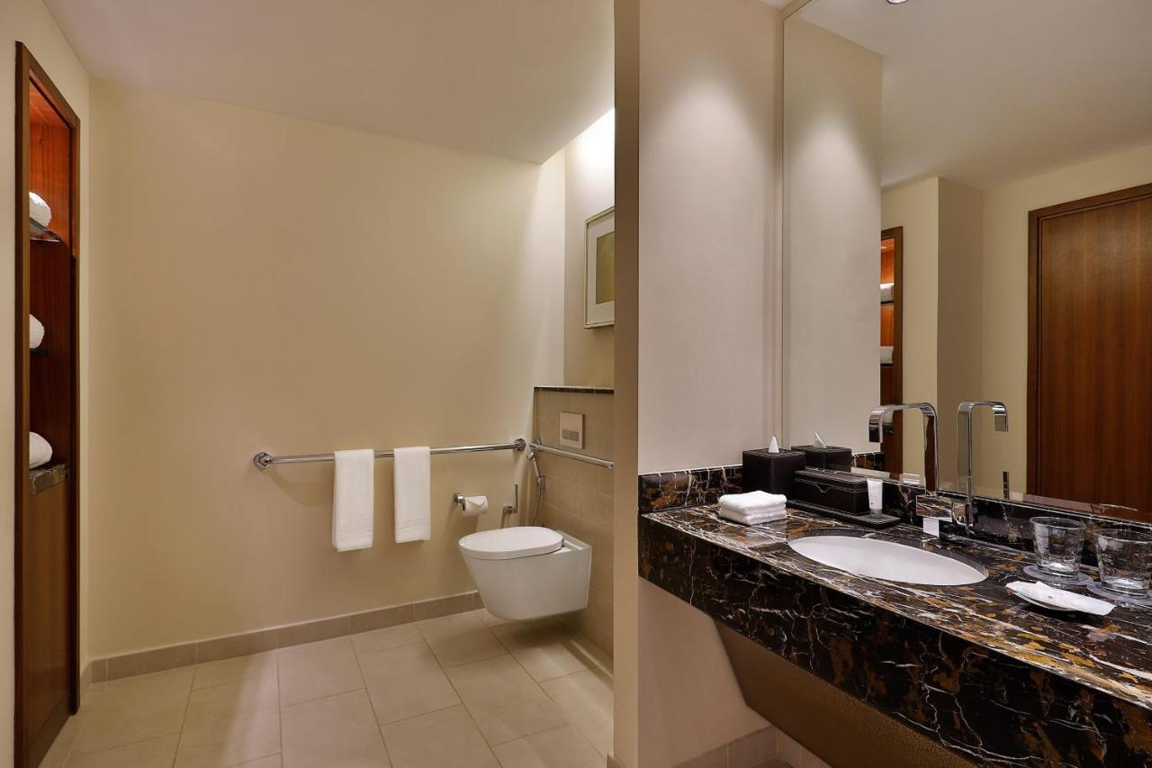 Chambre Deluxe avec 1 Lit King-Size et Balcon - Vue sur Golf