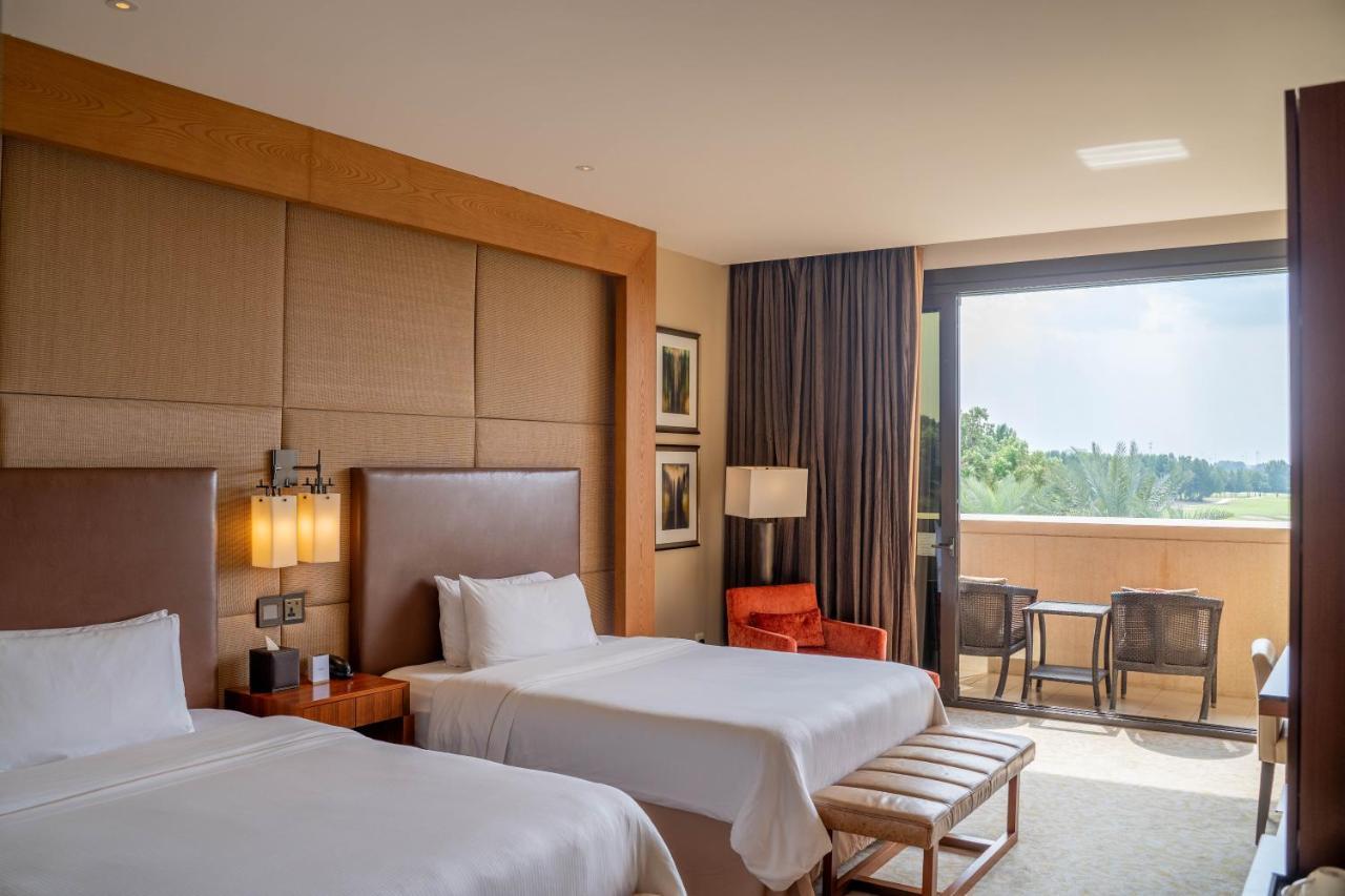 Chambre Deluxe avec 2 Lits Queen-Size et Balcon - Vue sur Golf