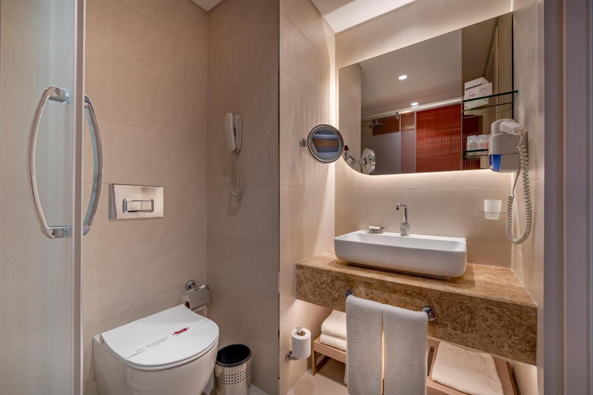 Chambre Double ou Lits Jumeaux - Vue Latérale sur Mer - Annexe
