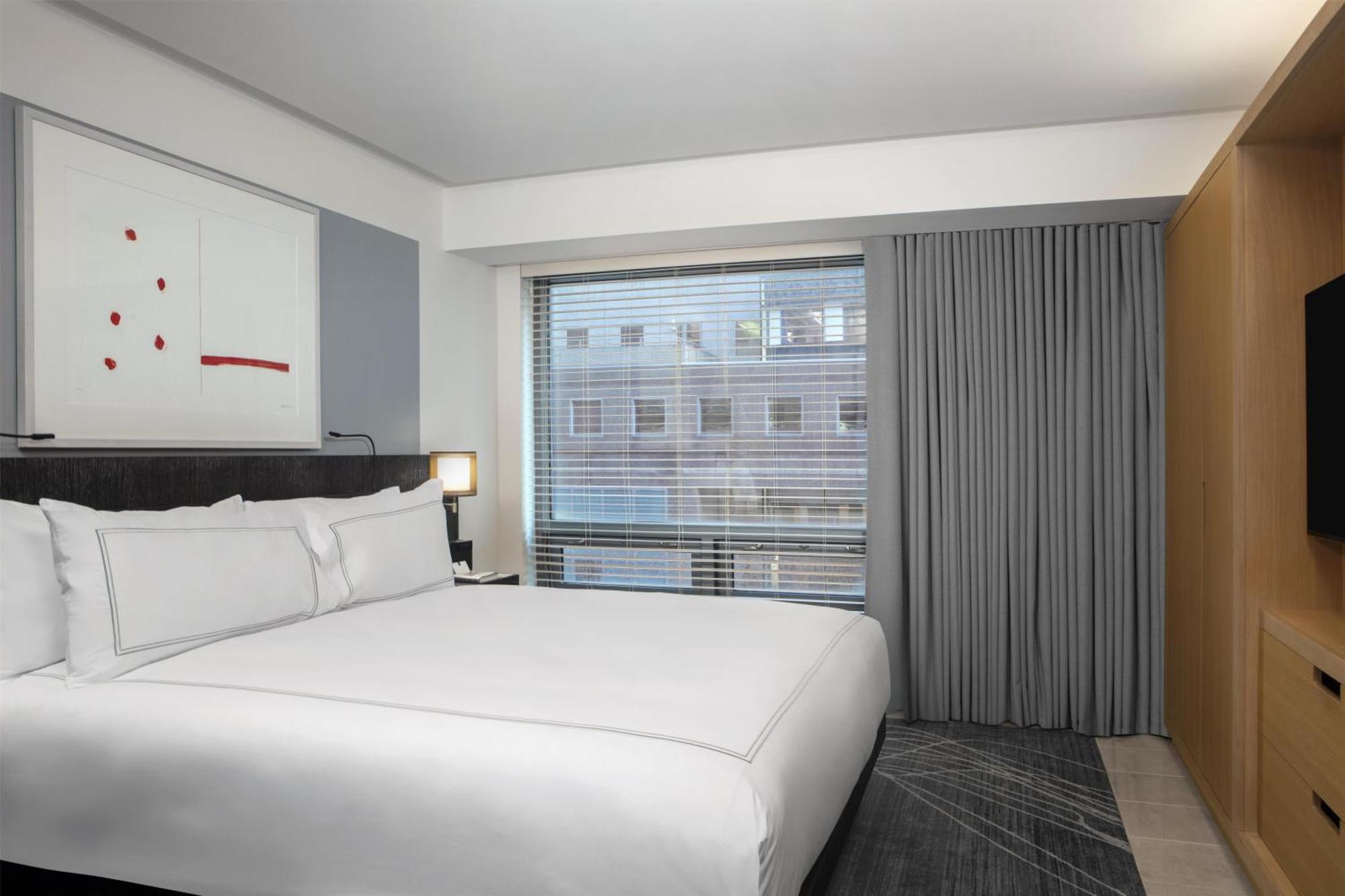 Suite Lit King-Size d'Angle de Luxe avec Canapé-Lit