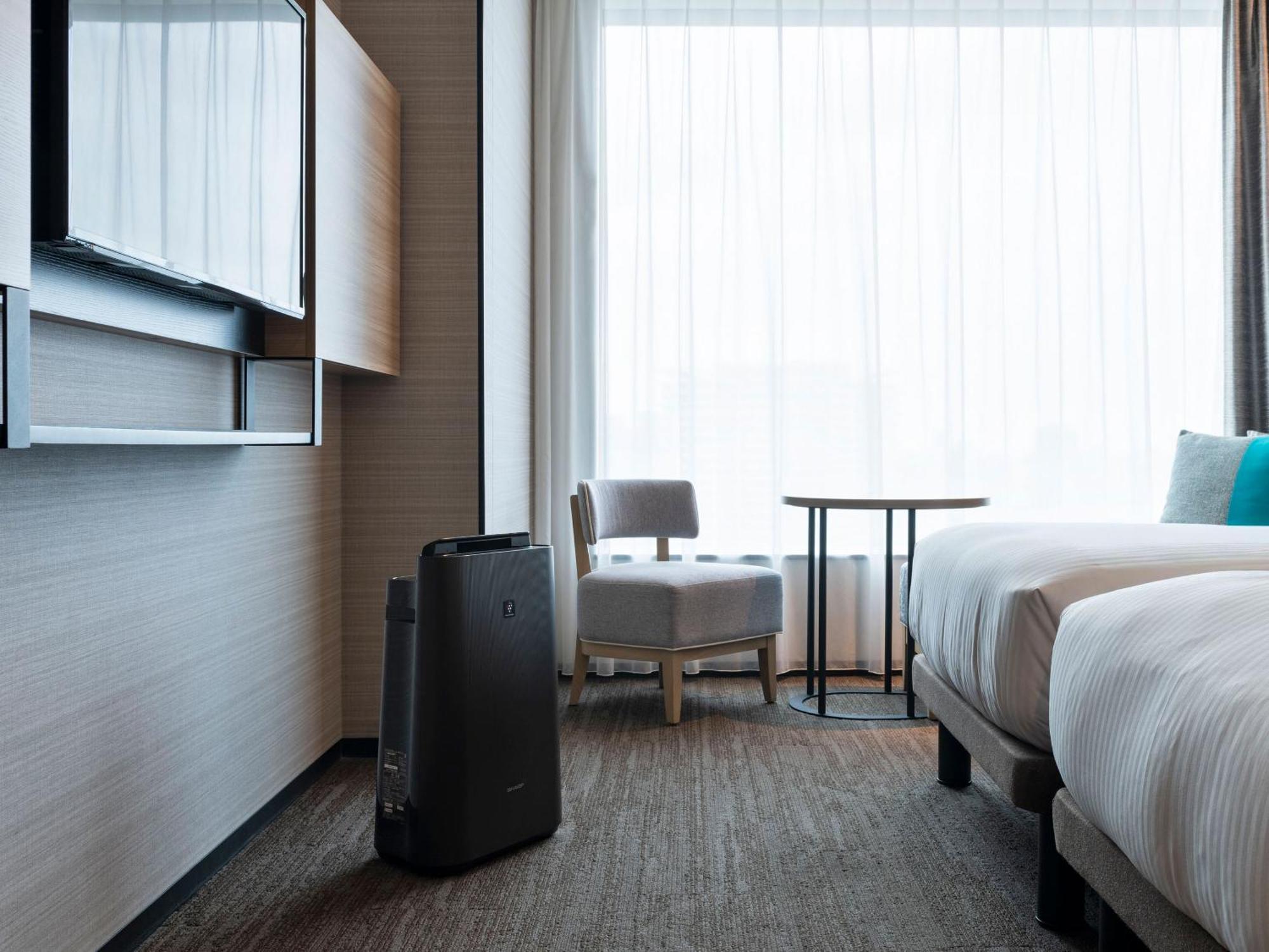 Chambre Lits Jumeaux Accessible aux Personnes à mobilité réduite